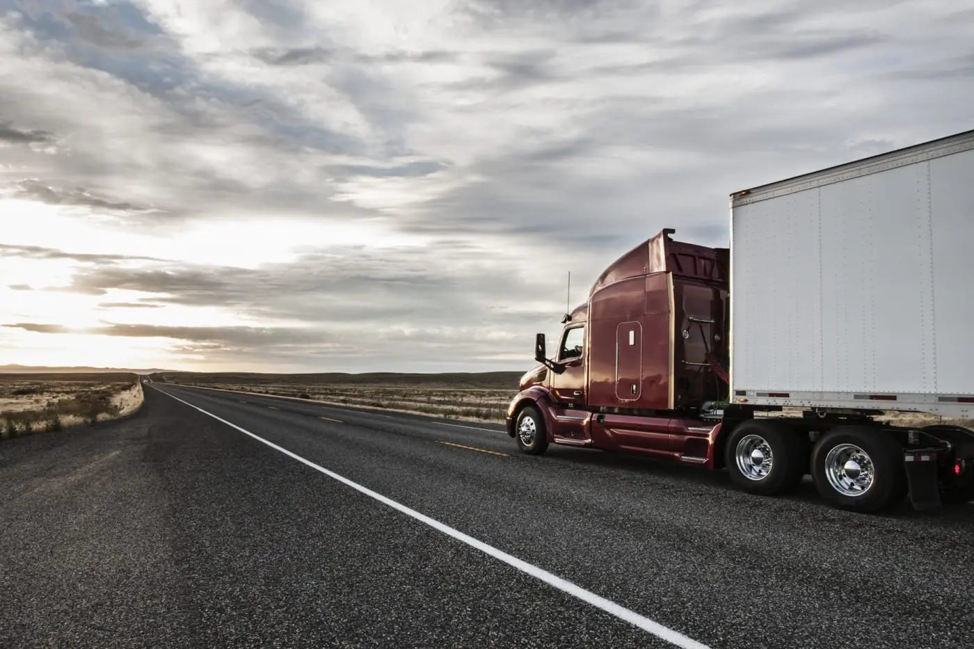 A Worthy freight truck on an open highway